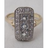A 9ct bi-coloured gold, diamond and three stone aquamarine, set dress ring