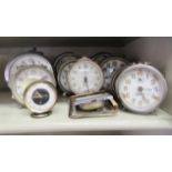 Twelve vintage design clocks and timepieces, all faced by Arabic dials  largest 6"h