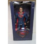 A 2013 Man of Steel promotional action figure, developed for DC Comics by Neca/Reel Toys  16"h