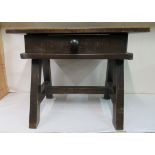 A modern oak side table with a single drawer, raised on block legs  19"h  24"w