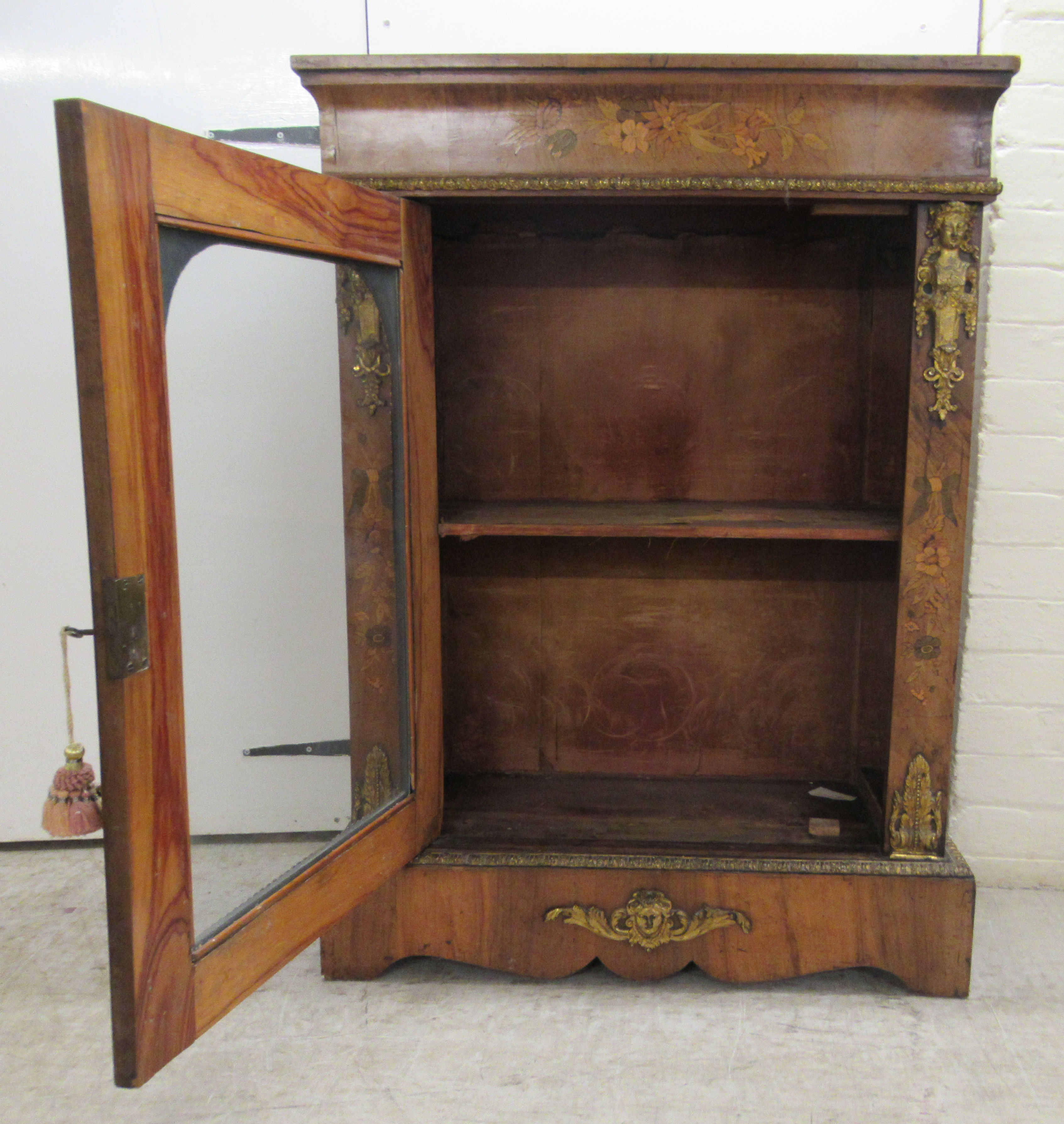 A late 19thC Continental gilt metal mounted walnut and floral marquetry pier cabinet, enclosed by - Image 7 of 9