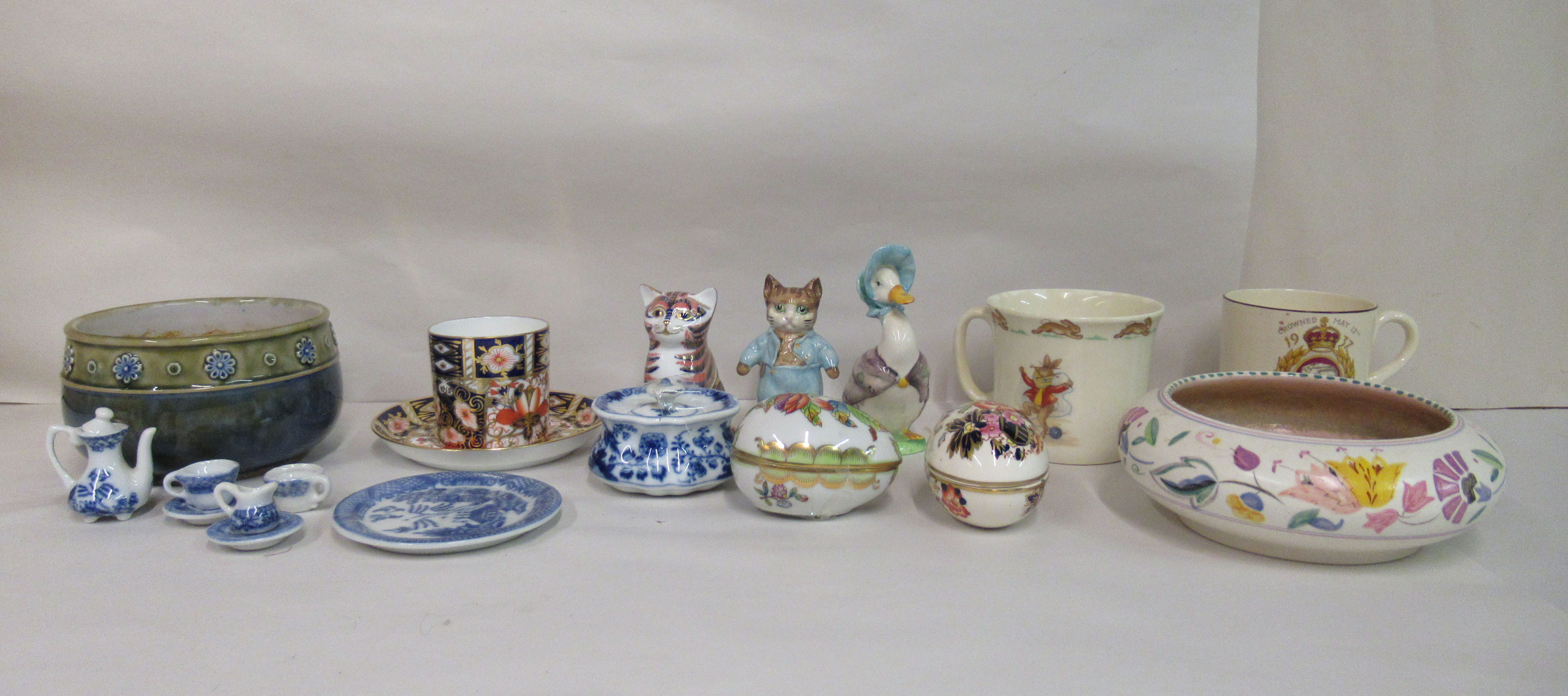 19thC and later decorative ceramics: to include a Royal Crown Derby china model, a cat  3.5"h with a