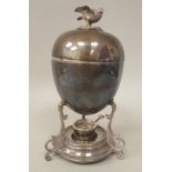 An Edwardian Walker & Hall silver plated egg coddler of ovoid form with a bird finial on the