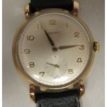 A 1950s Gerrard 9ct gold cased wristwatch, faced by an Arabic dial, incorporating subsidiary