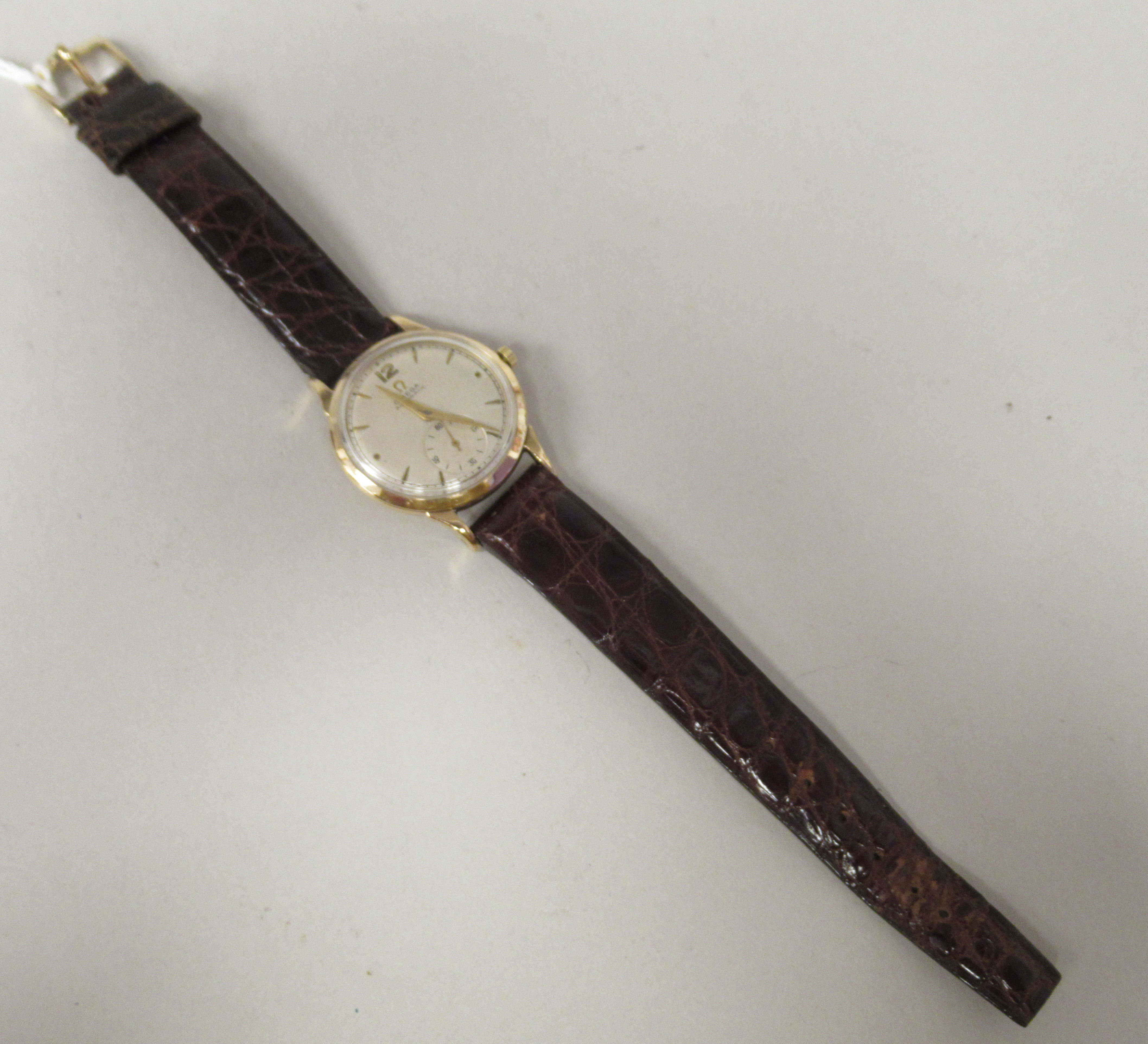 A 1950s Omega 9ct gold cased wristwatch, faced by a baton dial, incorporating a subsidiary, on a - Image 2 of 4
