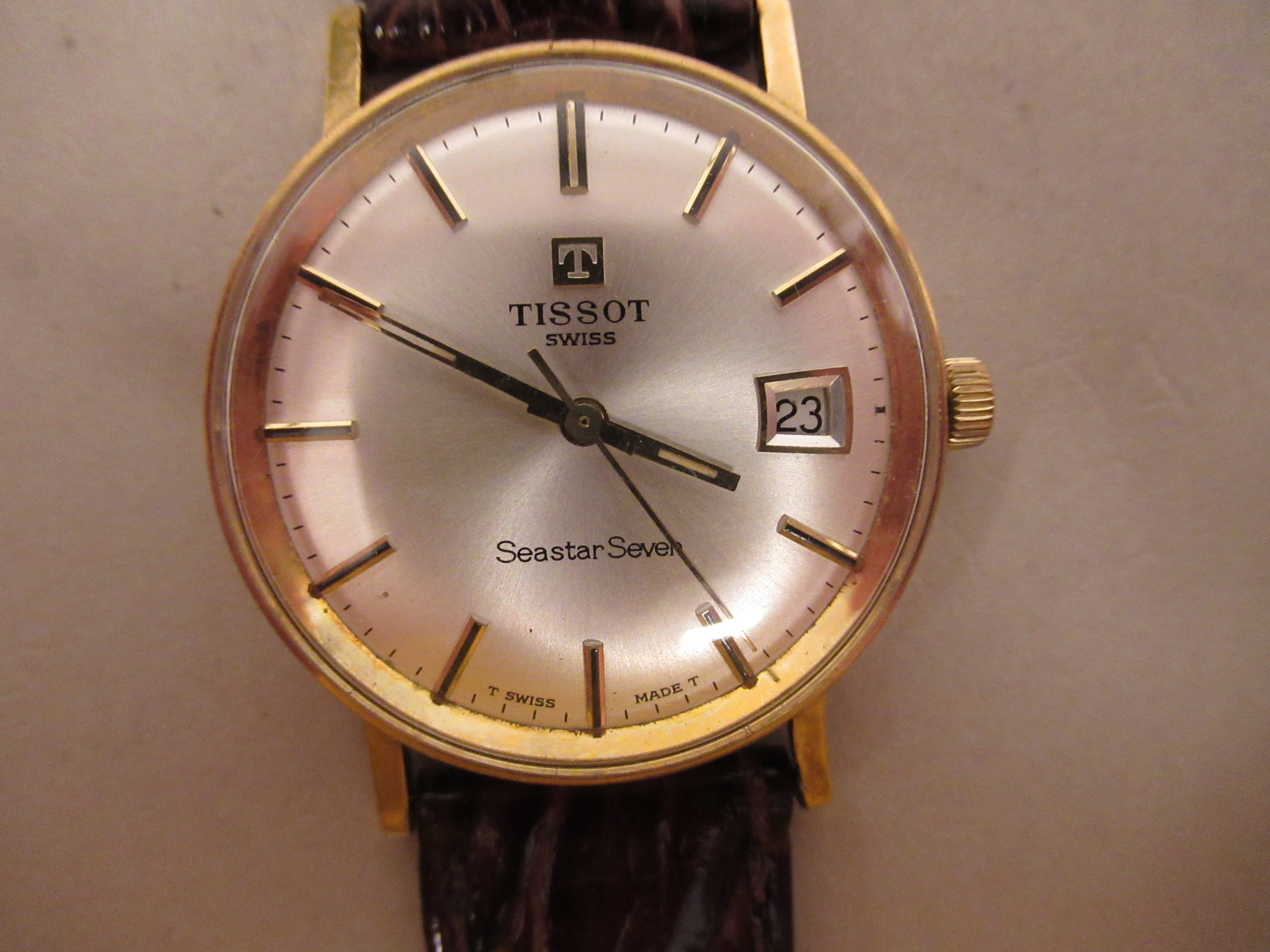 A 1970/80s Tissot Seastar Seven 9ct gold cased wristwatch, the movement with sweeping seconds, faced