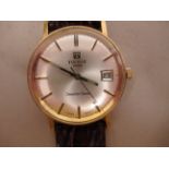 A 1970/80s Tissot Seastar Seven 9ct gold cased wristwatch, the movement with sweeping seconds, faced