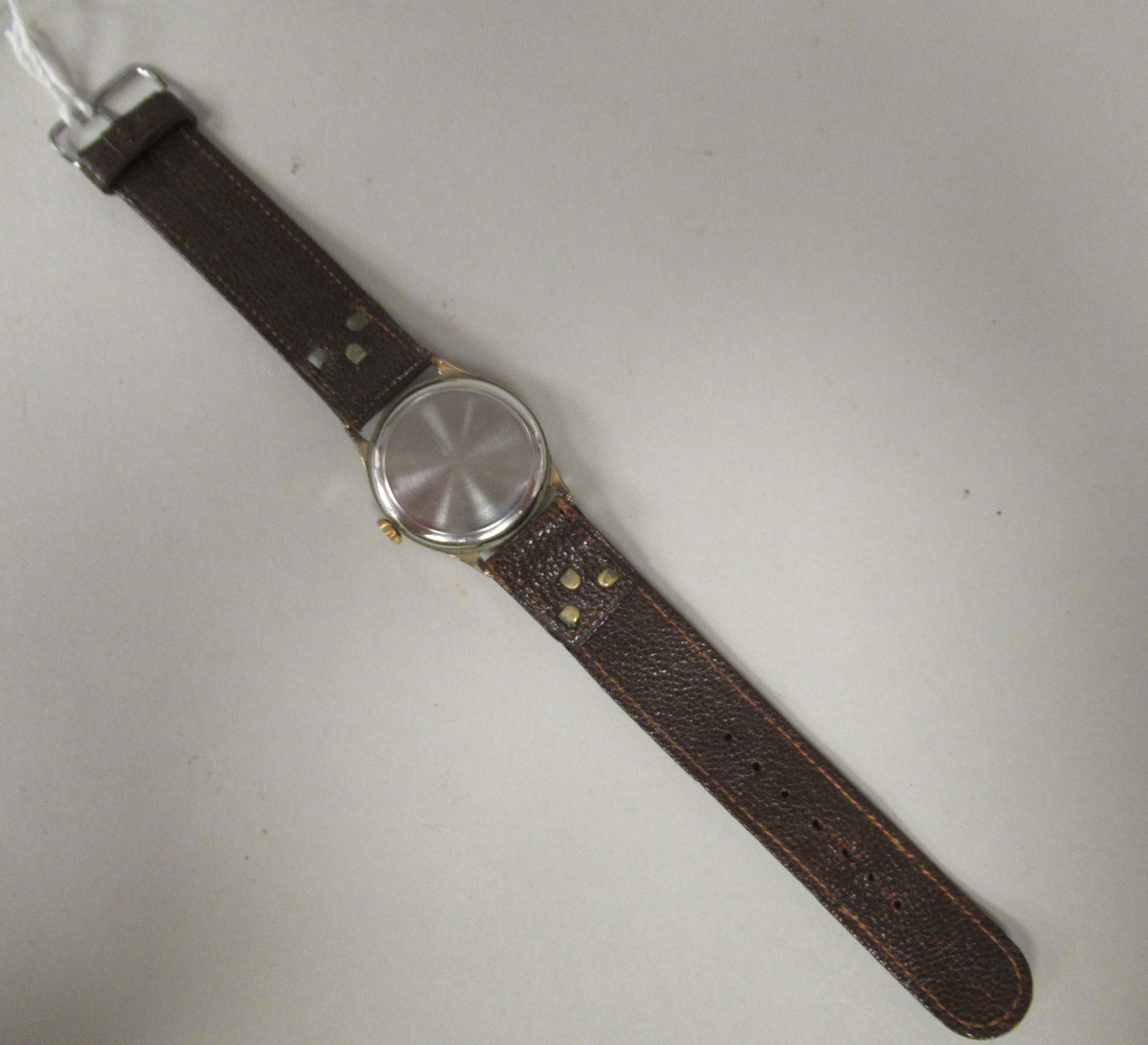 A 1940/50s Minerva gold plated/stainless steel cased wristwatch, faced by a silvered Arabic dial, on - Image 3 of 3