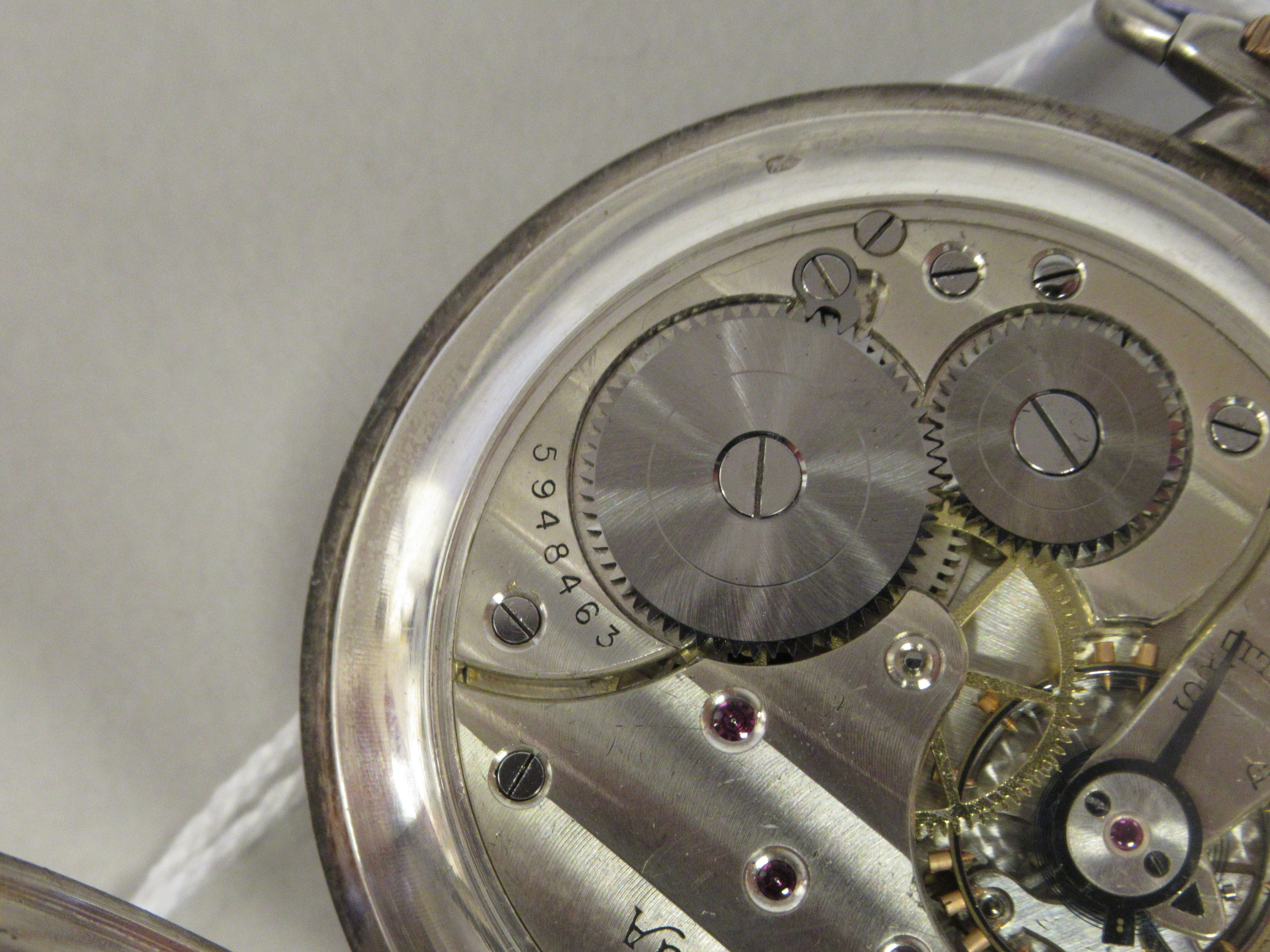 An Omega (900) silver coloured metal, slim cased pocket watch with a radiating engraved back, - Image 4 of 5