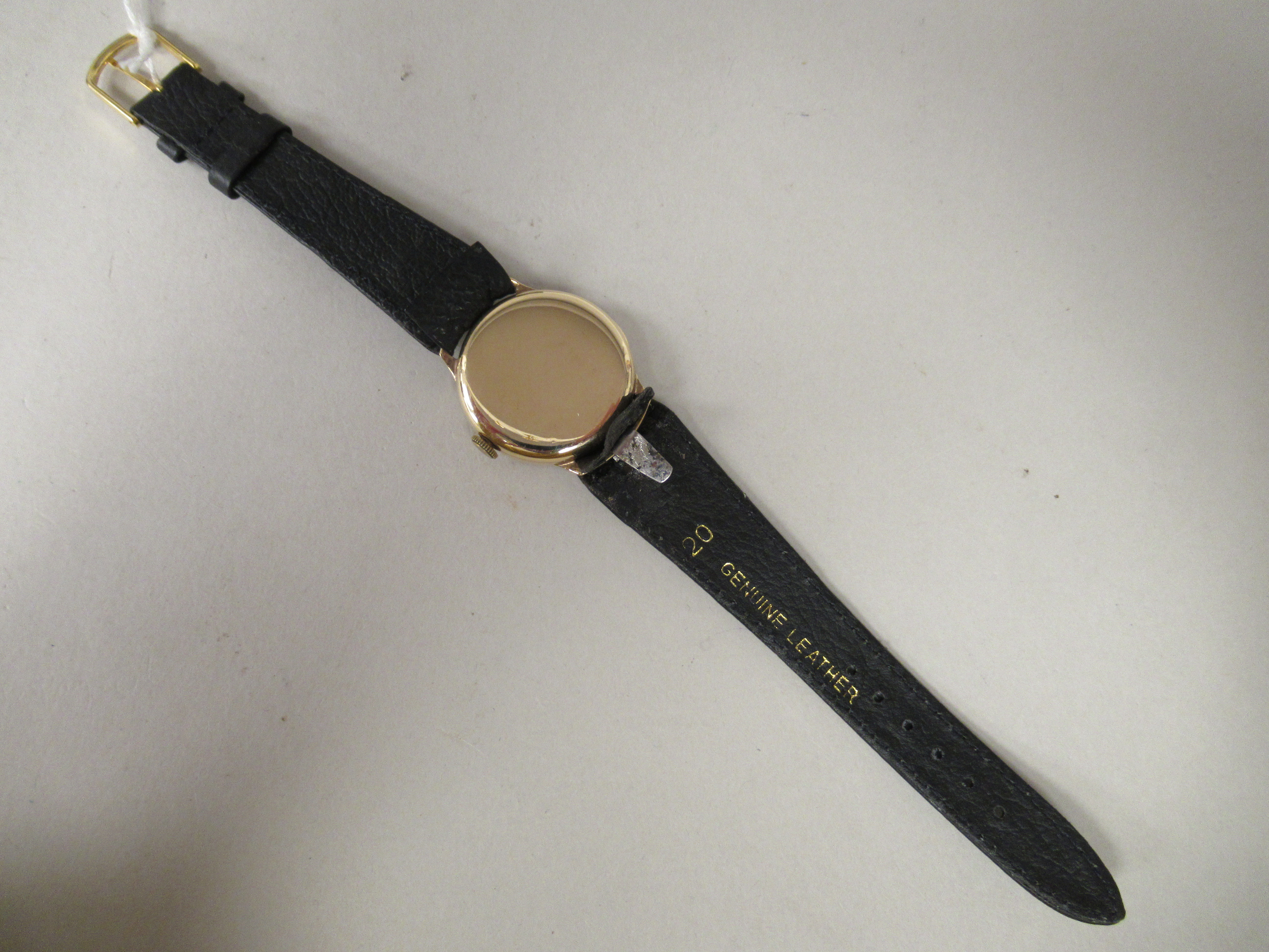 A 1930/40s Tissot 9ct gold cased wristwatch, faced by a bronze effect Arabic dial, incorporating a - Image 3 of 3