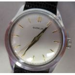 A 1958 Gubelin stainless steel cased wristwatch, the movement with sweeping seconds, faced by a