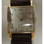 A 1930s Norda Art Deco 18ct gold cased wristwatch, faced by a silvered Roman dial, incorporating a