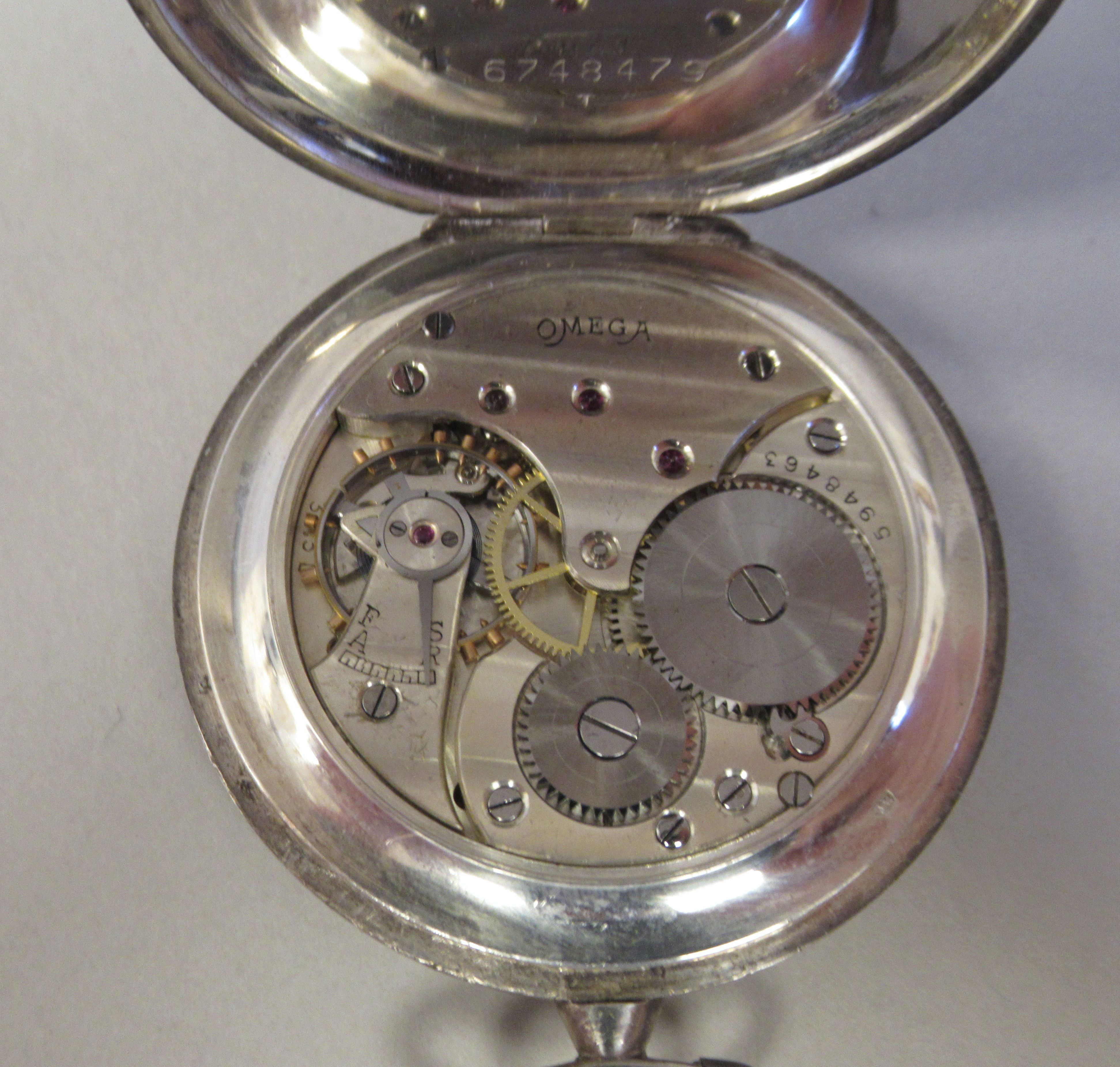 An Omega (900) silver coloured metal, slim cased pocket watch with a radiating engraved back, - Image 3 of 5