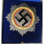 A German 1941 enamelled and gilded swastika emblem brooch badge  boxed (Please Note: this lot is