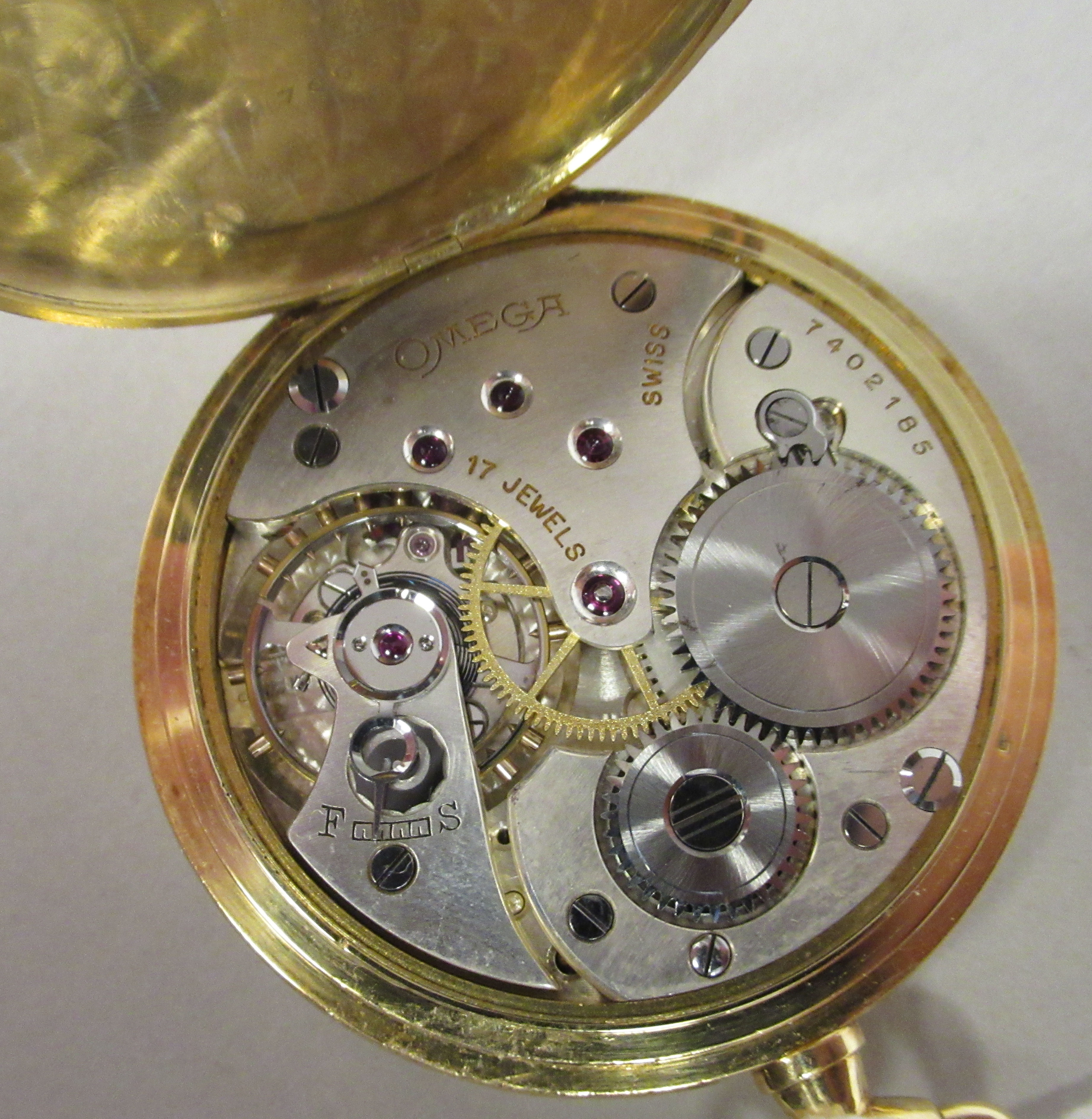 An Omega 18ct gold cased pocket watch with an engine turned back, faced by a white enamel Arabic - Image 3 of 6