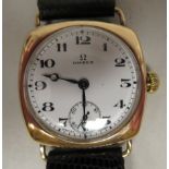 A 1930/40s Omega 9ct gold cushion cased wristwatch, faced by a white enamel Arabic dial,