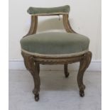 A 19thC carved giltwood framed dressing room chair with a low bar back, upholstered in