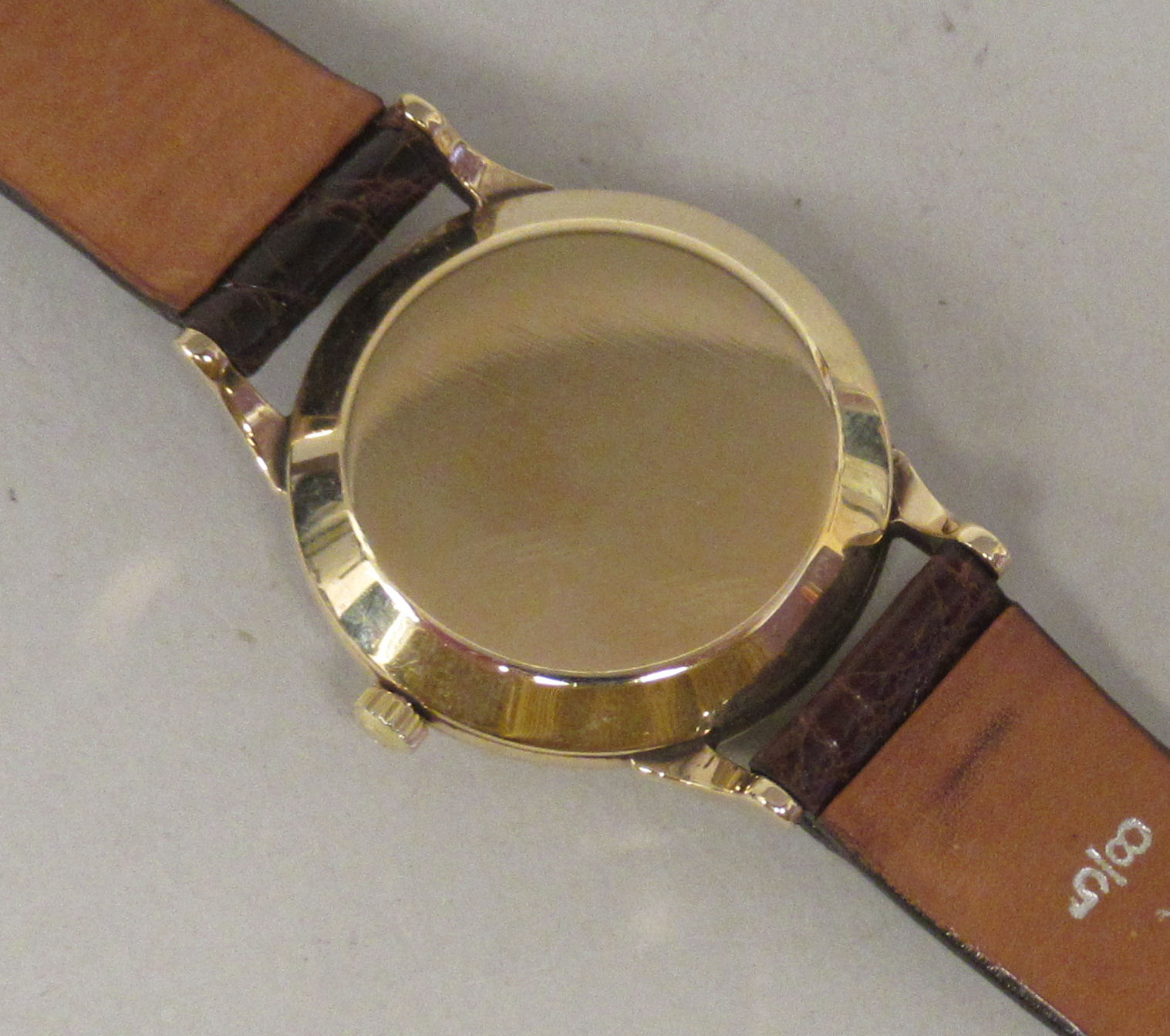 A 1950s Omega 9ct gold cased wristwatch, faced by a baton dial, incorporating a subsidiary, on a - Image 3 of 4