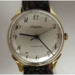A 1950s Minerva Antichoc 18ct gold cased wristwatch, the 7 jewel movement with sweeping seconds,