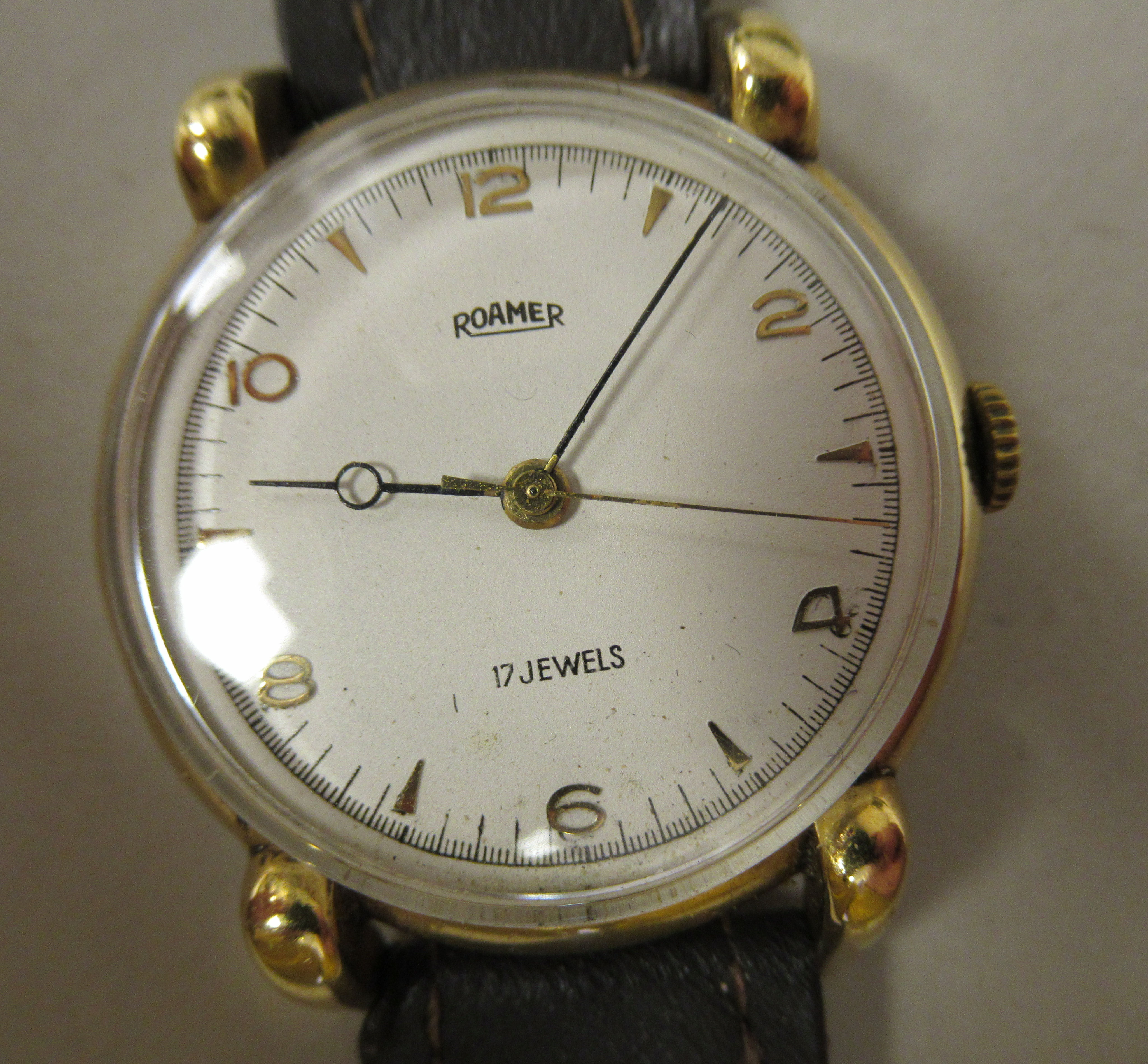 A 1940s Roamer 18ct gold cased wristwatch, the 17 jewel movement faced by an Arabic and baton