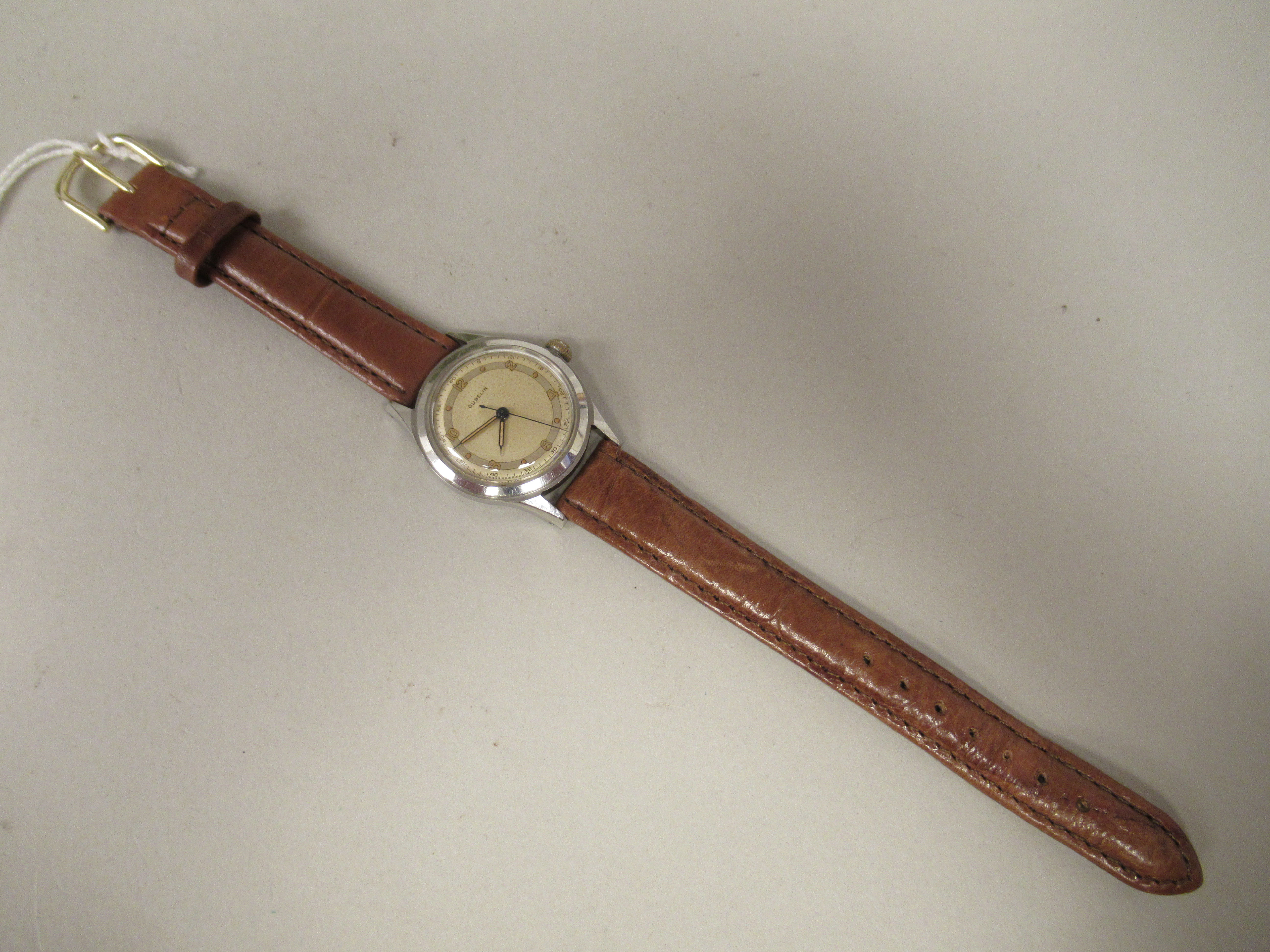 A 1950s Gublin stainless steel cased wristwatch, the movement with sweeping seconds, faced by an - Image 2 of 4