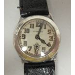 A 1929 Harwood silver cased wristwatch, (the first) automatic movement faced by an Arabic dial, on a