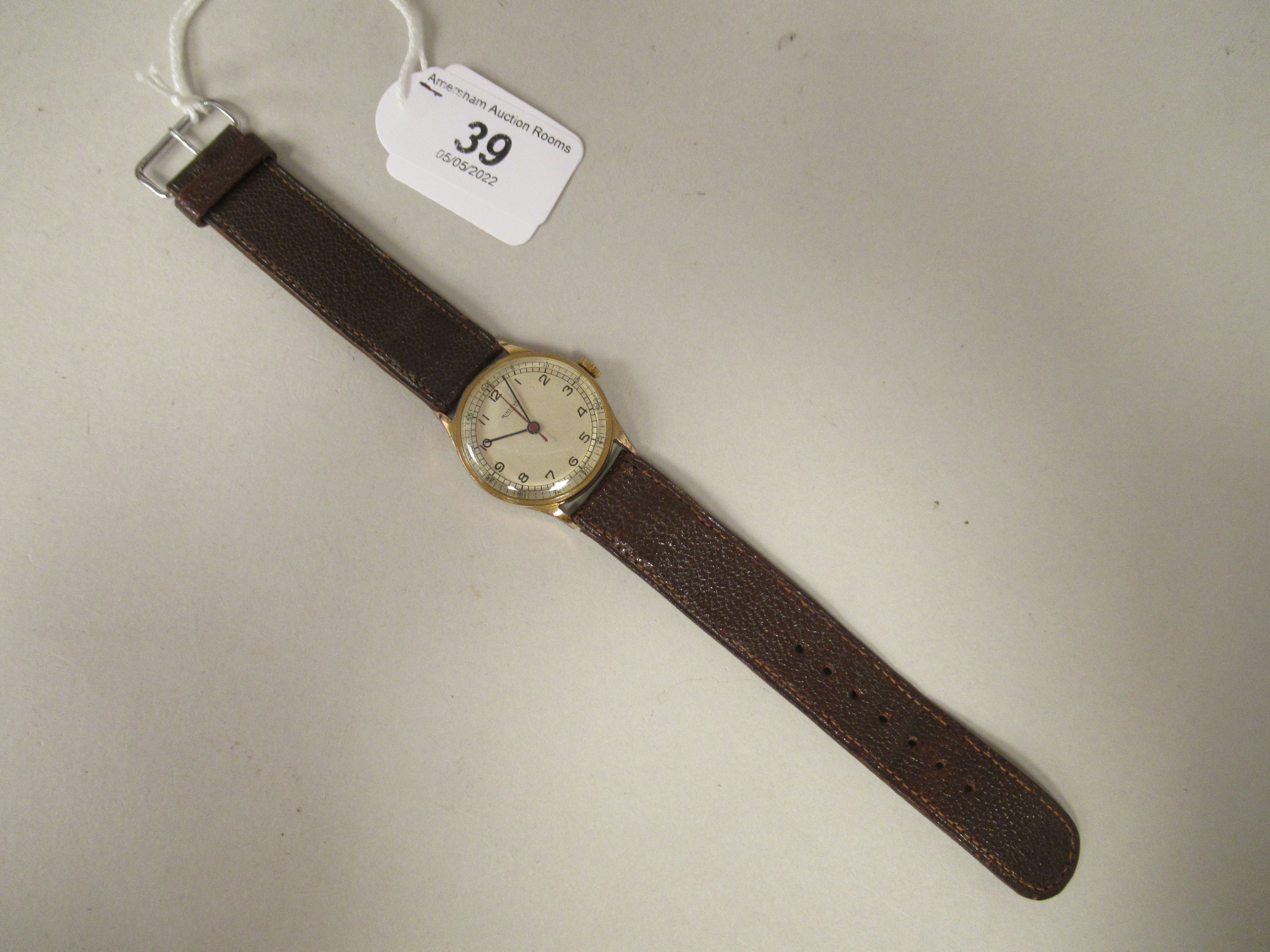 A 1940/50s Minerva gold plated/stainless steel cased wristwatch, faced by a silvered Arabic dial, on - Image 2 of 3