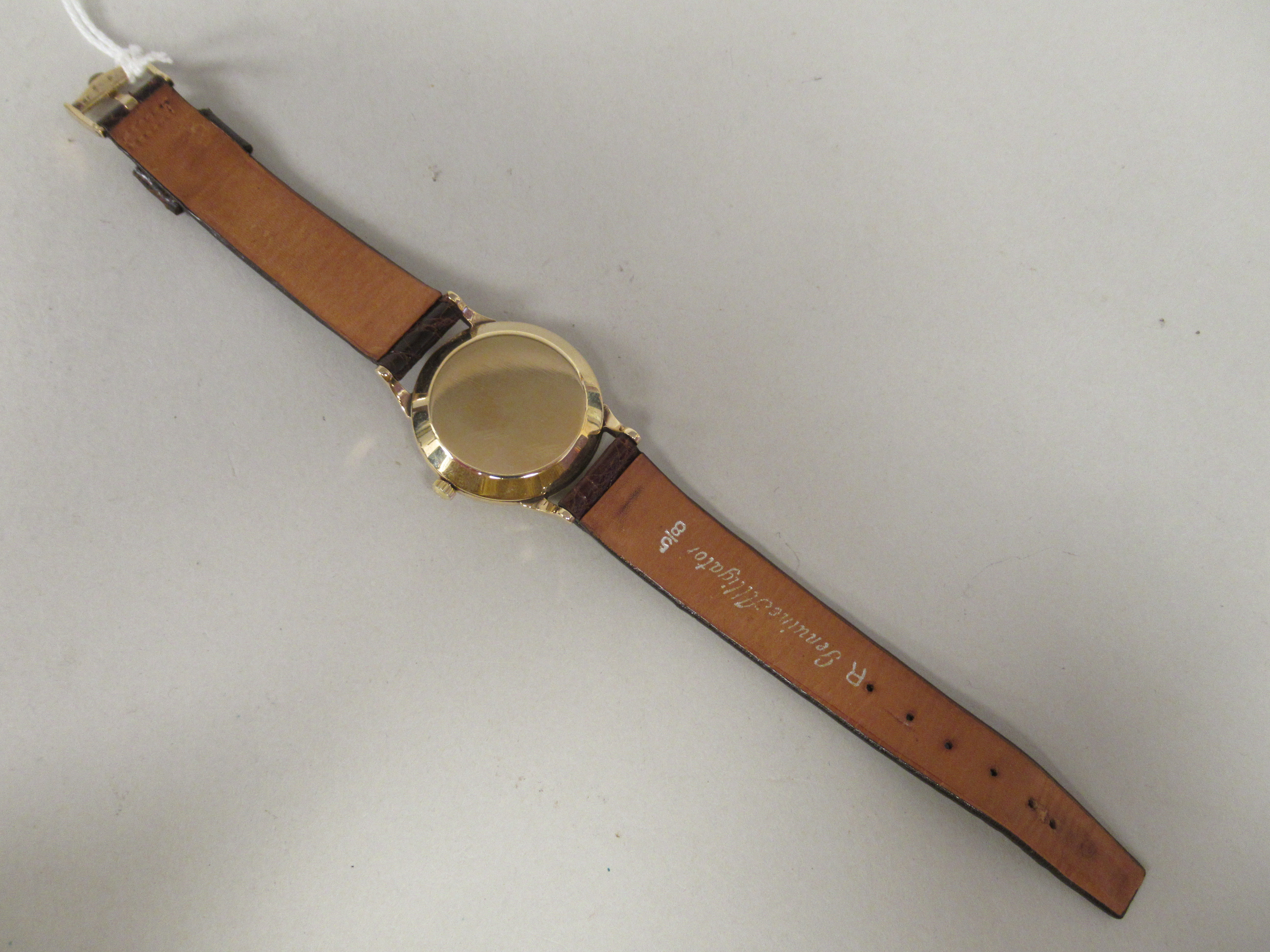A 1950s Omega 9ct gold cased wristwatch, faced by a baton dial, incorporating a subsidiary, on a - Image 4 of 4