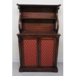 A late Regency mahogany chiffonier, the shelved superstructure with a brass gallery, on forward, S-