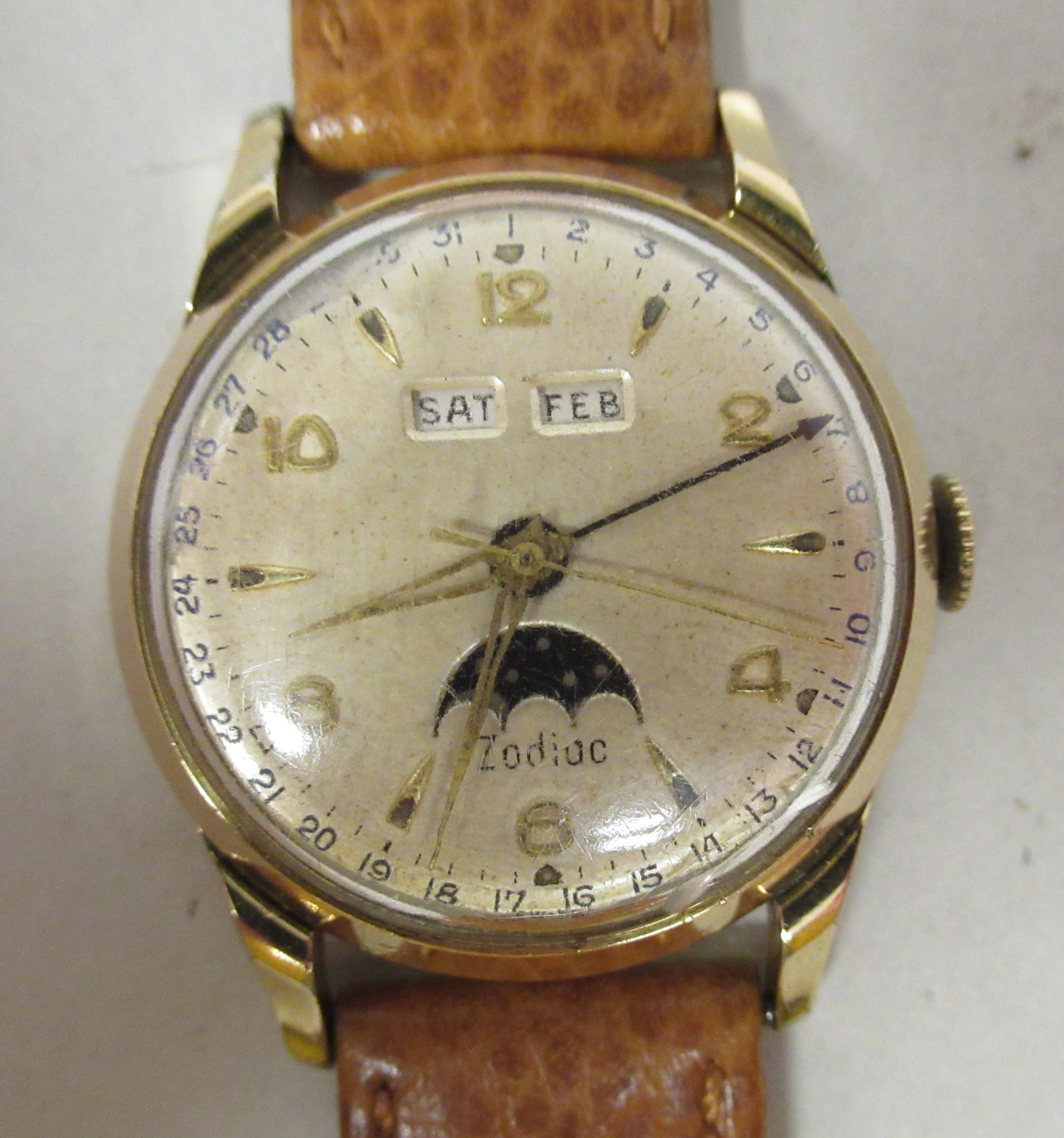 A 1950s Zodiac gold plated/stainless steel cased wristwatch, the movement with a pointer and