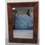 A mid 19thC string inlaid rosewood veneered framed mirror  19" x 26"