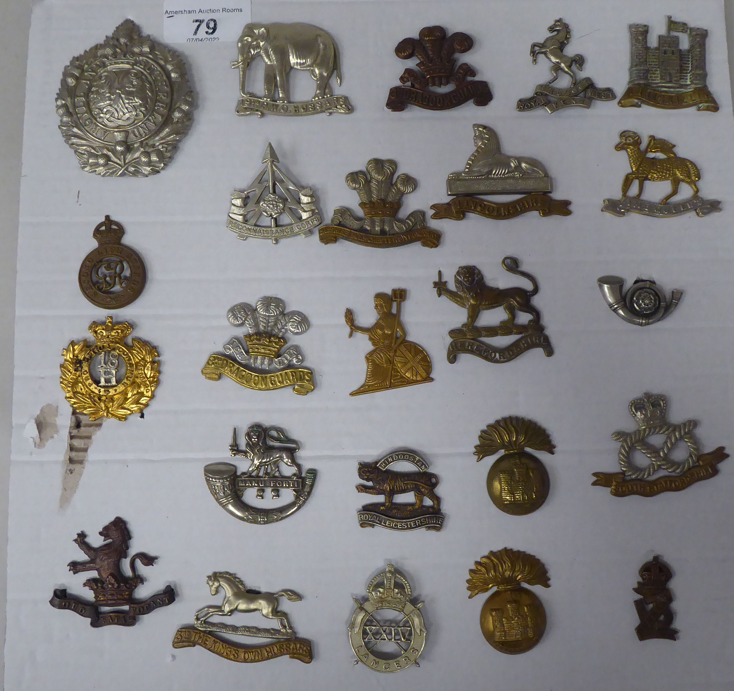 Twenty-four military cap badges, some copies: to include 3rd Dragoon Guards, 3rd King's Own