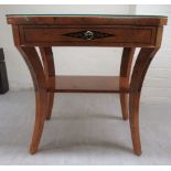A modern Continental antique inspired burr walnut veneered single drawer, two tier lamp table,