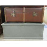 An early 20thC beech bound cabin trunk  13"h  33"w; and a contemporary grey painted pine tool chest