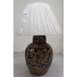 A modern gilded blue porcelain table lamp of bulbous, tapered form  24"h with a shade