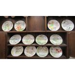 A set of twelve Cavers Wall china Months of the Year collectors plates, designed by John Ball,