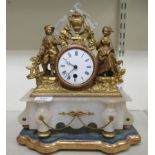 An early 20thC gilt metal mounted onyx mantel timepiece; the movement faced by a Roman dial, on a