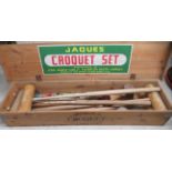 A vintage Jaques of London croquet set  comprising four mallets, four balls, a start peg, a mallet