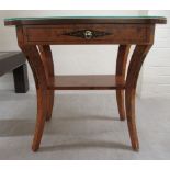 A modern Continental antique inspired burr walnut veneered single drawer, two tier lamp table,