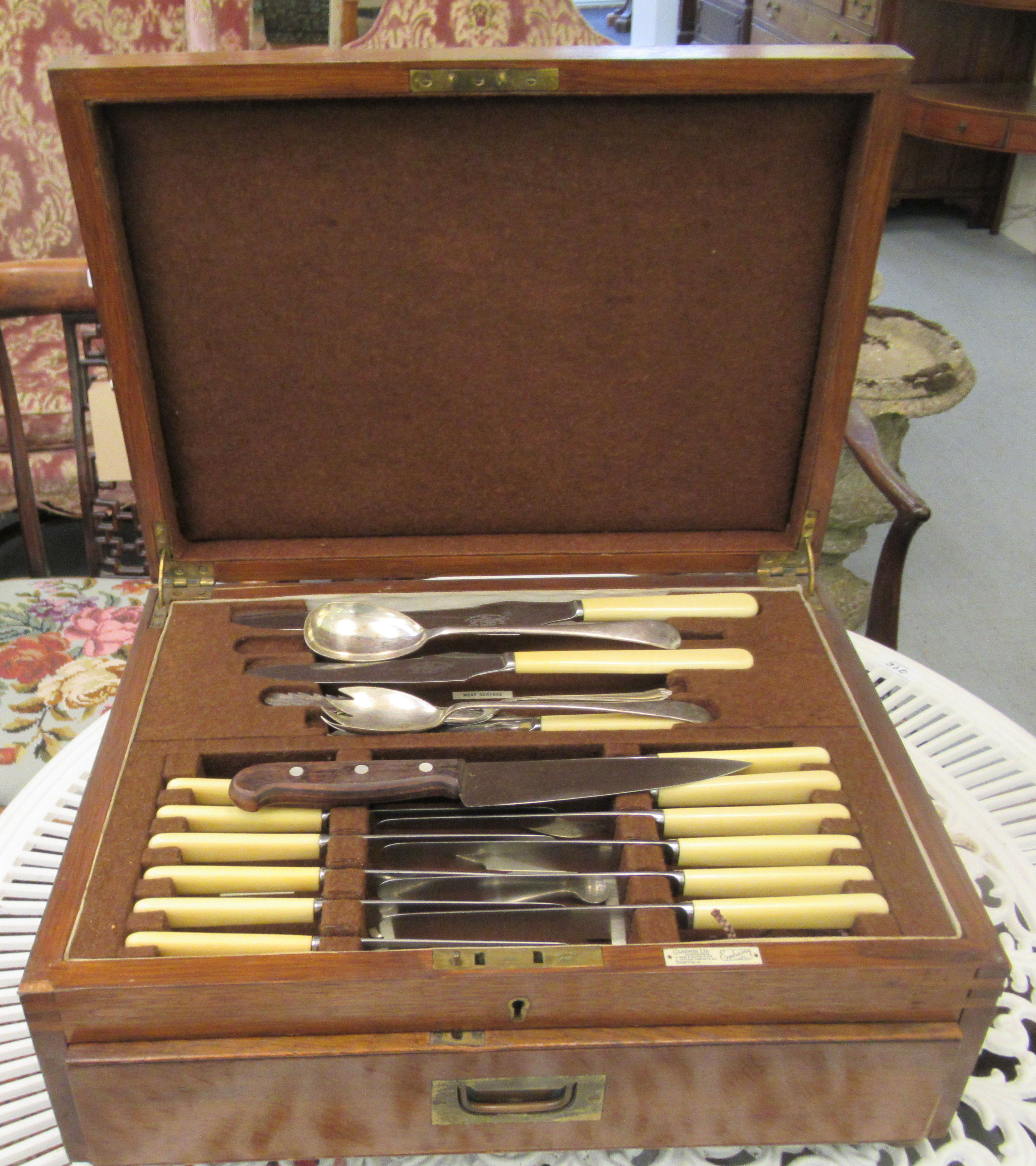 A part canteen of Old English pattern cutlery and flatware, in an oak case