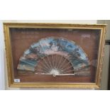 An early 20thC, possibly French, hand painted fan, later set in a glazed display case  21" x 14"