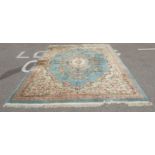 A Chinese washed woollen carpet, decorated in traditional taste in pastel tones  144" x 275"