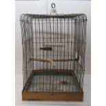 An early 20thC galvanised metal and wire constructed bird cage  25"h  18"sq