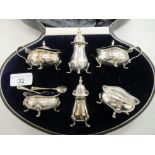 A silver six piece condiments set  comprising two salts, two mustard pots and two pepper pots