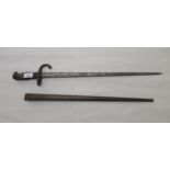 A late 19thC bayonet, the blade dated 1876 21"L  with a sheath  (Please Note: this lot is subject to