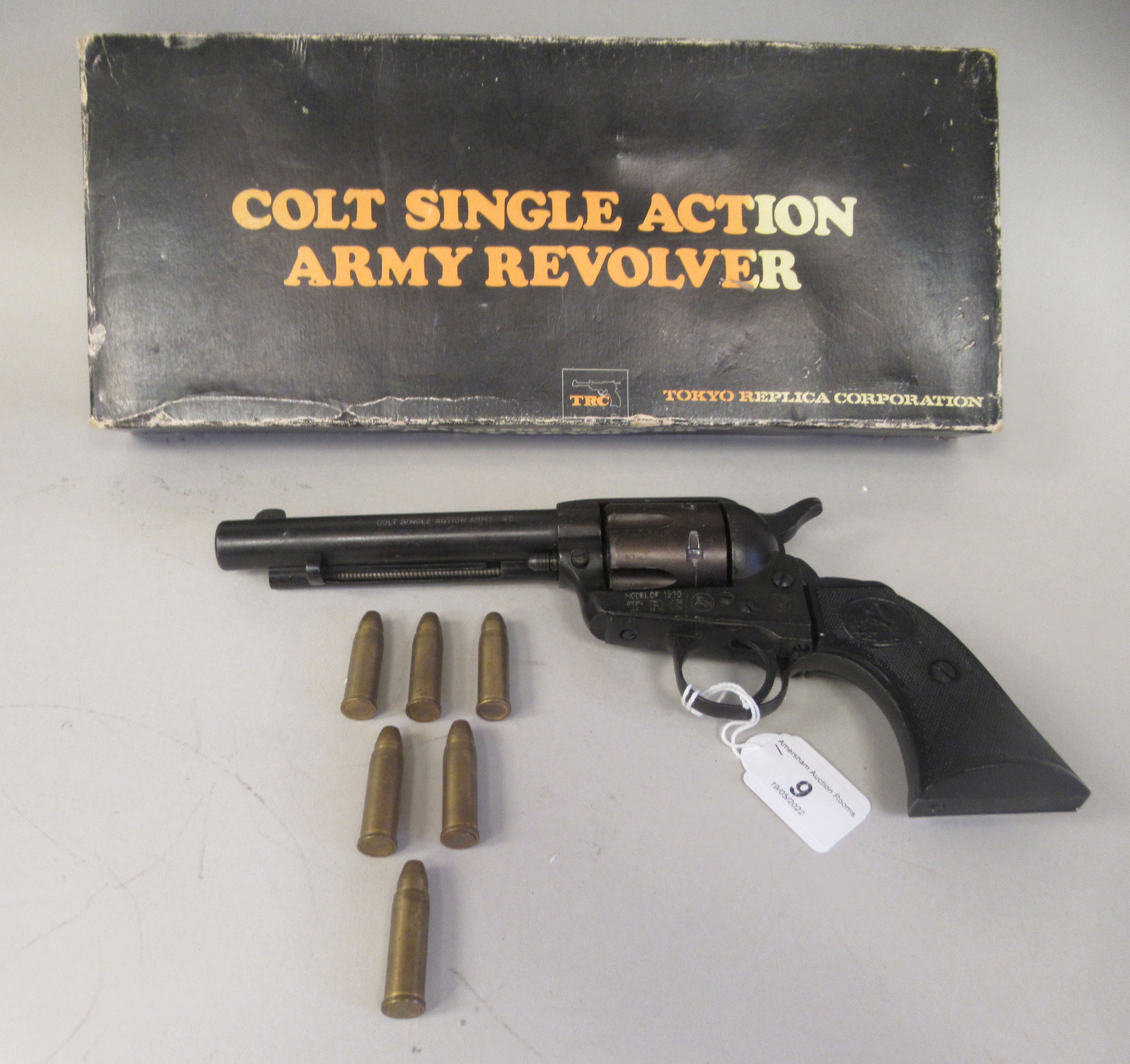 A replica TRC 1970s Colt 45 SA army revolver with six dummy rounds  cased