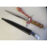 A Swiss M43 army officer's dagger with a stainless steel and two part, rivetted wooden handgrip,