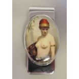 A silver coloured metal and enamel document clip, featuring a 1920s glamour girl  stamped 925