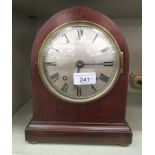 An early 20thC mahogany cased mantle clock; the movement faced by a Roman dial  10"h