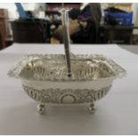 A late Victorian silver sugar basket with a swing top handle, on ball feet  Sheffield 1898  6"w